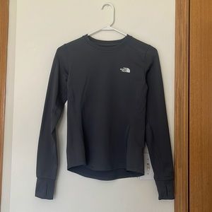 North face long sleeve, tight fitting, and flattering. Little thicker material.